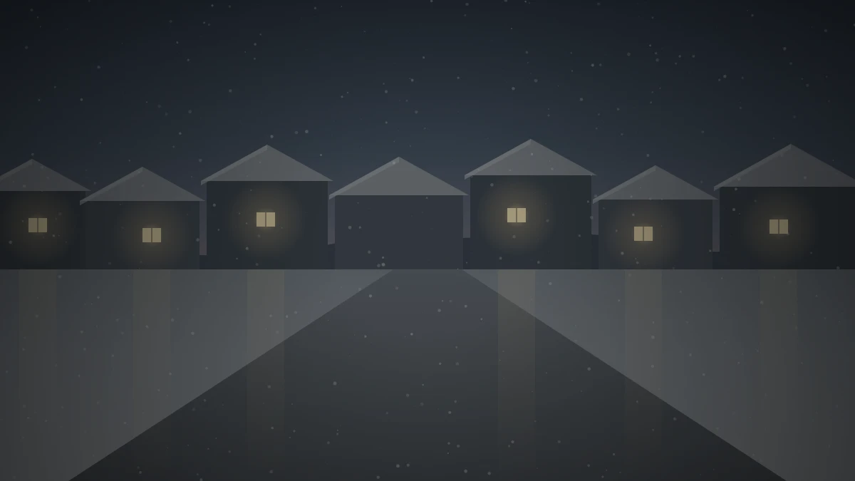雪の残る住宅街の夕暮れに窓の灯りがともっている様子